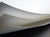 three pieces of white REVLAR Premium Synthetic Paper