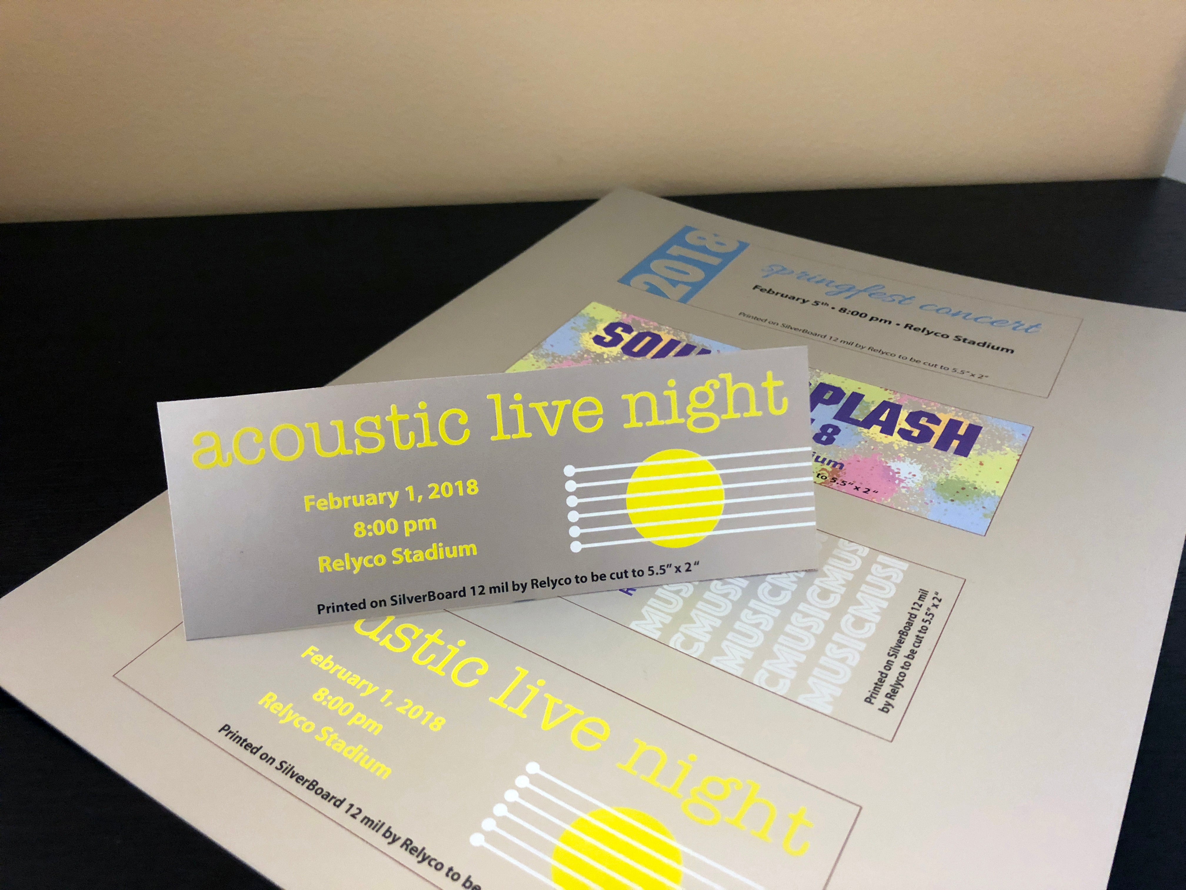 ticket printed on metallic silver printer paper