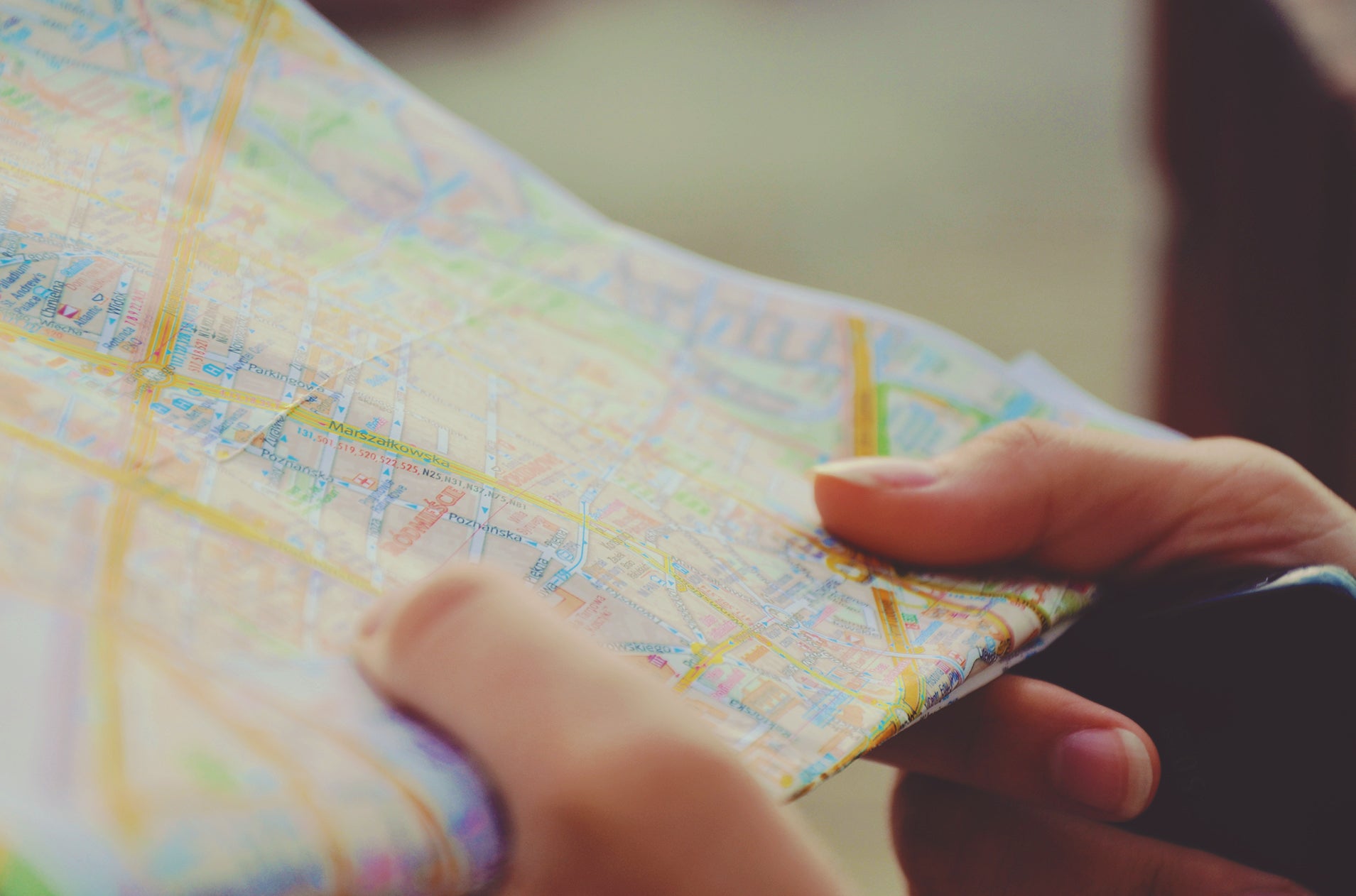 person holding city map